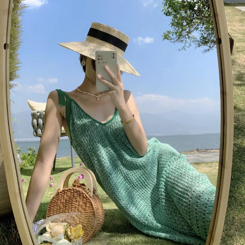 Zöld kötött harisnyatartó ruha, tengerparti nyaralás stílus, vékony, hosszú fenék a nő - 0